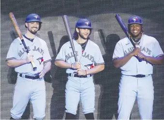  ?? STAN BEHAL/FILES ?? Toronto Blue Jays fans would love to get updates on such players as, from left, Randal Grichuk, Bo Bichette and Vladimir Guerrero Jr., but the ball club has been oddly silent compared to other MLB teams.