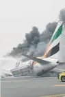  ??  ?? A firefighte­r on the ground died in this crash of an Emirates aeroplane, but the 300 passengers and crew survived.