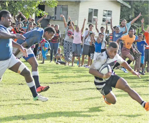  ?? Photo: Ronald Kumar. ?? Aca Silatolu of Rewa goes in for their second try against Nadi during the Skipper Cup Premiershi­p clash at Burebasaga ground on May 26, 2018.