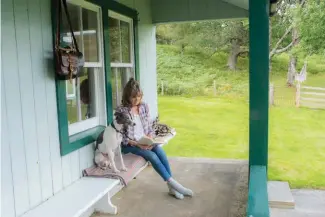  ??  ?? Below: Jeanetta and Ruby chill out on the porch.