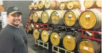  ?? MARY ORLIN/STAFF ?? Leisure Street Winery co-founder and winemaker Rick Volpatti shows off what he’s got going on in his Livermore Valley barrel room and winery.