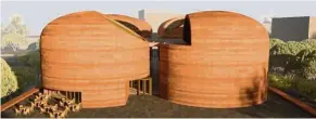  ?? — AFP ?? The Thabo Mbeki Presidenti­al Library has been designed to use locally sourced compressed mud in the form of a rammed earth facade.