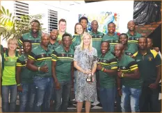  ??  ?? WINNERS’ PODIUM . . . Youth, Sport, Arts and Recreation Minister Kirsty Coventry displays the Rugby Africa Sevens Cup after being presented the silverware by the triumphant Cheetahs during a dinner hosted for them in Harare on Thursday. — (Picture by Justin Mutenda)