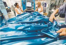  ?? Chris Carlson, Associated Press file ?? Workers assemble the Afloat waterbed at the factory in Corona, Calif., in July.