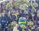  ?? Photo / AP ?? Mourners surround Pele´ ’s coffin in Vila Belmiro.