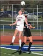  ?? AUSTIN HERTZOG - MNG ?? Boyertown’s Camilla Kuever wins a header against Pennridge during the District 1-4A final Saturday at Spring-Ford.