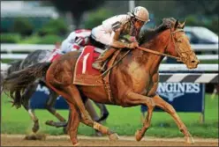  ?? PHOTO NYRA ?? Yoshida, trained by Bill Mott with Joel Rosario aboard races to the front and the win of Saturday’s Grade 1 Woodward at Saratoga Race Course.