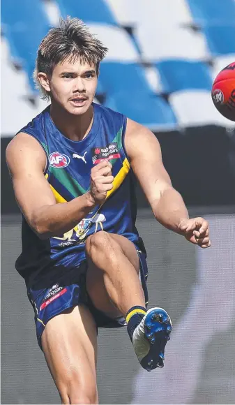  ??  ?? Austin Harris in training for the NAB AFL Academy squad. Picture: Michael Klein