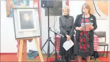  ??  ?? Mayor Tracey Collis and Sue McLeod Chair of the Lindauer Society open the Art Exhibition at the Woodville Race Course on Tuesday April 18 and acknowledg­e the gift of a new Lindauer of Elizabeth Prattley (displayed left).