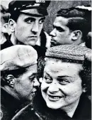  ?? ?? William Klein, top, in Paris, 2002; above, his picture ‘4 Heads’ taken at Macy’s Thanksgivi­ng Parade, New York, 1954; and, left, a typically stylised fashion image from 1962, for Vogue:– the magazine cropped out the barber