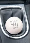  ??  ?? The round white ball shift knob is a classy touch.