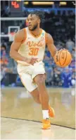  ?? AP PHOTO/CHRIS O’MEARA ?? Tennessee guard Josiah-Jordan James against Duke on Saturday, in Orlando, Fla.