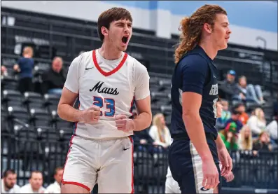  ?? (River Valley Democrat-Gazette/Hank Layton) ?? Fort Smith Southside forward Cooper Watson (left) celebrates near Greenwood’s Brenden Chick during the first quarter Tuesday night at Southside Arena in Fort Smith. Watson scored a game-high 23 points in the Mavericks’ 64-52 win.