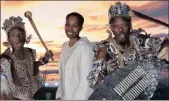  ?? PICTURE: FRANCES PARK-ROSS ?? IN BUSINESS: The KZN Travel and Adventure Show opened yesterday, at the entrance to the ECR House and Garden Show. Celebratin­g the occasion at the Tourism KZN stand were, left and right, Zulu dancing brothers, Sondlo and Nkazimulo Ngidi, with Mpume...