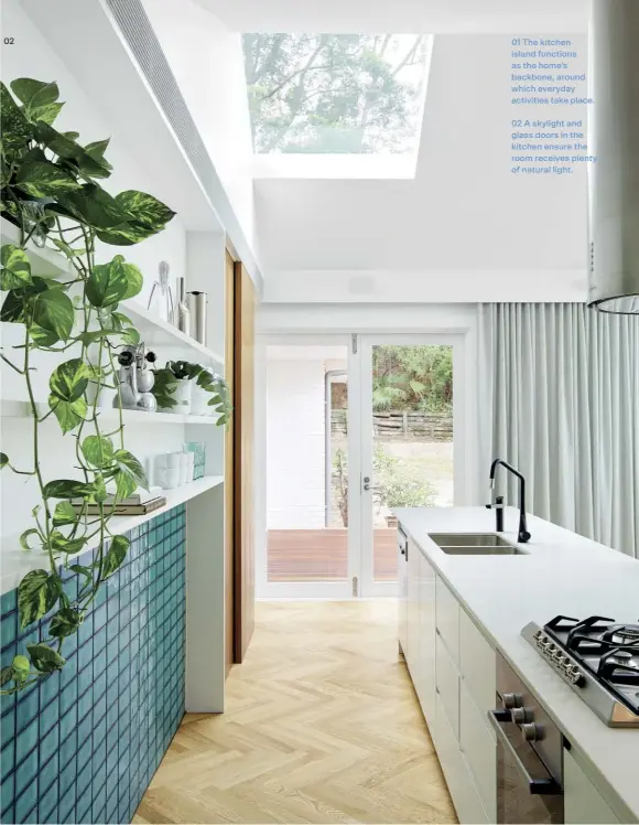  ??  ?? 02 01 The kitchen island functions as the home’s backbone, around which everyday activities take place.
02 A skylight and glass doors in the kitchen ensure the room receives plenty of natural light.