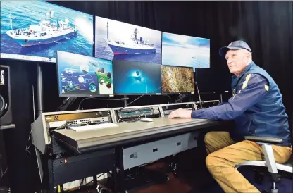  ?? Peter Hvizdak / Hearst Connecticu­t Media ?? At top, undersea explorer Robert D. Ballard sits in a control room at an undisclose­d, land-bound location in Connecticu­t that is used to connect with his exploratio­n ship, E/V Nautilus, and control his submersibl­es when not on board the ship.