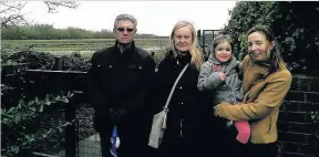  ??  ?? Halebank Parish Council chair Colin Rowan with residents opposed to more than 1,700 new homes which could be built in the area