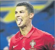  ?? ASSOCIATED PRESS FILE PHOTO ?? Portugal’s Cristiano Ronaldo sticks out his tongue during the Portugal against Sweden UEFA Nations League Sept. 8 match at Friends Arena in Stockholm, Sweden.