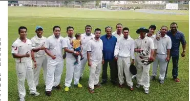  ??  ?? Cikgu Jerome (in blue shirt) with his former cricket boys of Sekolah Kebangsaan Sultan Yahya Petra 2.