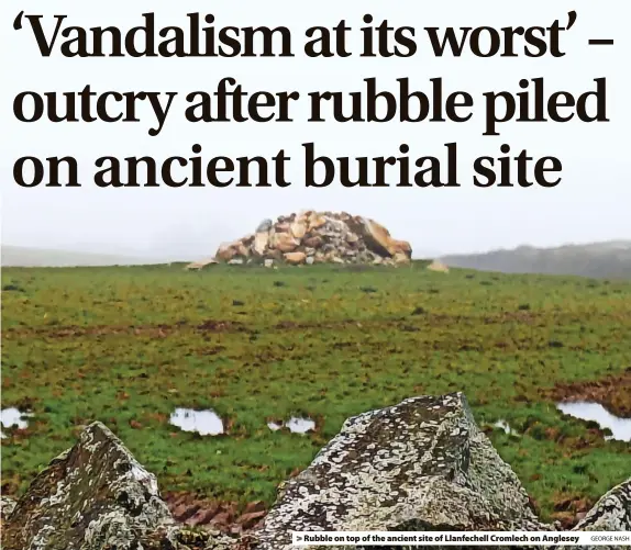  ?? GEORGE NASH ?? > Rubble on top of the ancient site of Llanfechel­l Cromlech on Anglesey