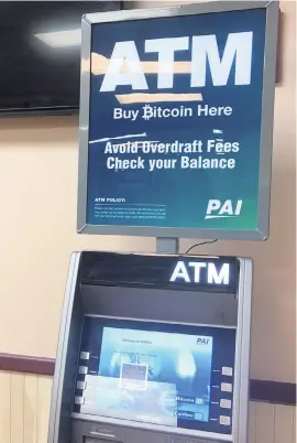  ?? TED SHAFFREY AP ?? Increasing­ly, Bitcoin is offered for sale at ATMs across the country. There are 384 alone between Boynton Beach and Homestead.