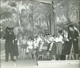  ?? Photo courtesy University of Arkansas Libraries Special Collection­s (MC1949) ?? A photo from an early Opera in the Ozarks performanc­e of “The Bartered Bride” is just one of nearly 6,000 photos that will be available for viewing in the Opera in the Ozarks Archives at the UA Mullins Library.