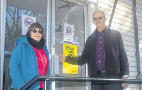  ?? DAVE STEWART/THE GUARDIAN ?? Jim and Diane Farquharso­n of Charlottet­own were two of many people who cast ballots at the advance poll on Monday at the Sherwood Recreation Hall. The next advance poll is on Friday, with election day taking place on Monday, Nov. 5.