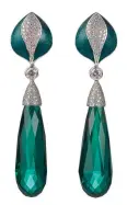  ??  ?? Henn of London Blue-green tourmaline facetted drops in 18-karat gold with diamonds, enamel and hand engraving