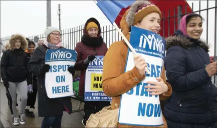  ??  ?? ABOVE AND RIGHT: Nurses on strike outside Wexford General Hospital last Tuesday.