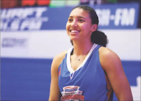  ?? Icon Sportswire / Icon Sportswire via Getty Images ?? UConn freshman Azzi Fudd at the American Family Insurance High School Slam Dunk & 3 Point Championsh­ips in Indianapol­is in March. Fudd has thrived during her first month at UConn.