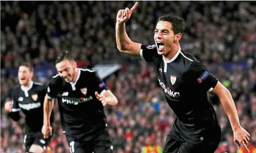  ?? — Reuters ?? Out to spoil the party: Sevilla’s Wissam Ben Yedder (right) celebratin­g after scoring against Manchester United in the Champions League last-16 second-leg match at Old Trafford on March 13.