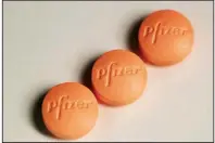  ?? AP ?? Pfizer Inc., which manufactur­es pharmaceut­ical drugs such as Relpax migraine pills, agreed to combine its off-patent drugs division with Mylan, a maker of generic drugs.