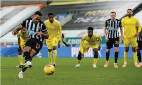  ?? Photograph: Serena Taylor/Newcastle United/Getty Images ?? Callum Wilson equalises from the penalty spot against Fulham on Saturday. Many believe the striker’s eight goals are papering over the cracks at St James’ Park.