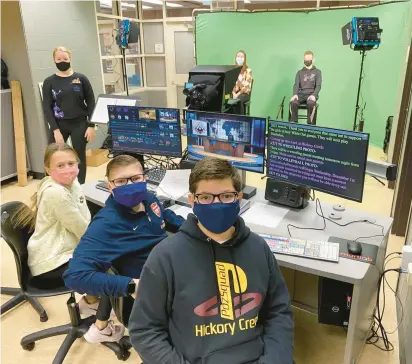  ?? SCHOOL DISTRICT 157-C ?? Students at Hickory Creek Middle School in Frankfort participat­e in a training session for their new studio space, dubbed “Tiger TV.”