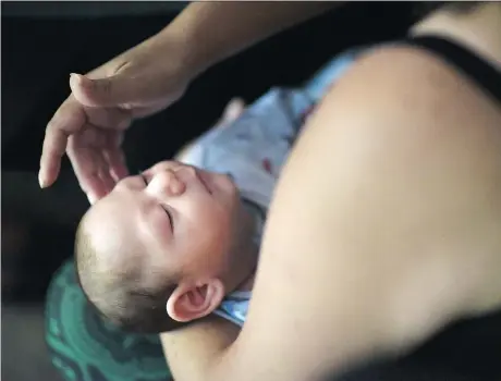  ?? THE ASSOCIATED PRESS ?? Two-month-old Inti Perez has been diagnosed with microcepha­ly linked to the Zika virus that infected his mom Michelle Flandez.