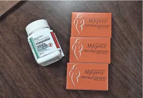  ?? ROBYN BECK/AFP VIA GETTY IMAGES ?? Mifepristo­ne is used with another medication called misoprosto­l to end a pregnancy that is less than 70 days developed.