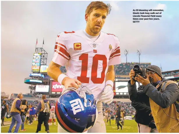  ?? GETTY ?? As Eli Manning will remember, Giants took long walk out of Lincoln Financial Field many times over past few years.