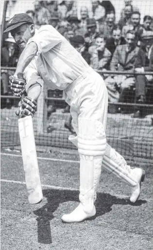  ?? PHOTO: GETTY IMAGES ?? Simply the best . . . Australian cricketing great Don Bradman demonstrat­es his skills while batting in the nets during a training session in 1938.