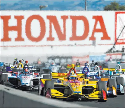  ?? Elijah Nouvelage The Associated Press ?? Ryan Hunter-reay leads the Verizon Indycar Grand Prix of Sonoma in 2018. Indycar has an opportunit­y to win over Formula One fans disinteres­ted in its lack of competitiv­e races.