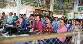  ??  ?? rice farmers at a training programme on growing other crops in the sangkaburi district of Chainat province. — Bloomberg