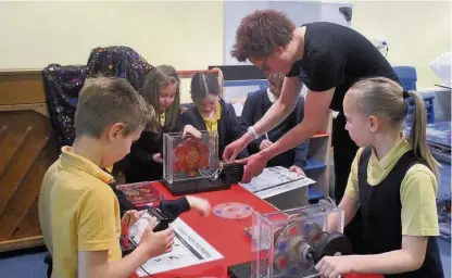  ??  ?? Science visit Generation Science came to Loch Primary to show the pupils where electricit­y comes from