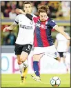  ?? (AP) ?? Bologna’s Simone Verdi scores during a Serie A soccer match between Inter Milan and Bologna, at the Bologna Dall’Ara Stadium,
Italy on Sept 19.