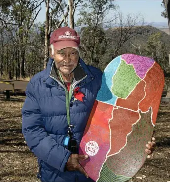  ?? Battle of One Tree Hill, ?? SPECIAL HONOUR: Darby McCarthy was presented with a painting by Kim Walmsley in recognitio­n of his involvemen­t in creating the history, honouring local Aboriginal Warrior, Multuggera­h. One Tree Hill is now known as Table Top Mountain.