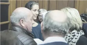  ??  ?? STILL SMILING. Danielle Janse van Rensburg, the girlfriend of convicted killer Henri van Breda, outside court yesterday.