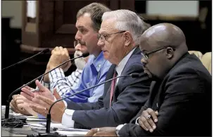  ?? Arkansas Democrat-Gazette/STATON BREIDENTHA­L ?? Arkansas Department of Correction officials Maj. Randy Shores (from left), Chief Deputy Director Dale Reed and spokesman Solomon Graves take questions from lawmakers Tuesday.