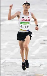  ?? CP PHOTO ?? Tenth-place finisher Eric Gillis of Antigonish, N.S., approaches the finish line in the men’s marathon at the 2016 Summer Olympics in Rio de Janeiro, Brazil.