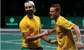  ?? ?? Australia captain Lleyton Hewitt and player Jordan Thompson celebrate victory in the Davis Cup quarter-final against Netherland­s. Photograph: Quality Sport Images/Getty