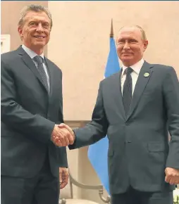  ??  ?? President Mauricio Macri met with Russian President Vladimir Putin in South Africa on Thursday.