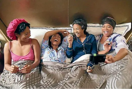  ??  ?? Girls Trip is The Hangover, Bridesmaid­s and a dozen lesser films right down to its chassis. It’s also an assault on a truck load of assumption­s about gender and race. Newcomer Tiffany Haddish in particular strips the paint off the walls in a couple of...