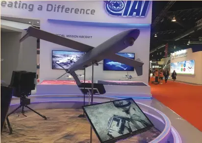  ?? (Brenda Goh/Reuters) ?? A DRONE MODEL is displayed at the Israel Aerospace Industries booth yesterday at the Singapore Airshow. Analysts say China has not yet taken away any business from US and Israeli drone manufactur­ers and has so far just sold to customers that are unable...